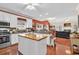 Kitchen with island, hardwood floors and open floor plan at 637 Sparrow Dr., Surfside Beach, SC 29575