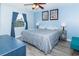 Spacious bedroom with king-size bed and light blue walls at 638 Waterway Village Blvd. # 16G, Myrtle Beach, SC 29579