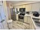Efficient kitchen with stainless steel appliances and light cabinets at 638 Waterway Village Blvd. # 16G, Myrtle Beach, SC 29579