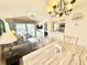 Open living space with dining area, kitchen and access to balcony at 638 Waterway Village Blvd. # 16G, Myrtle Beach, SC 29579
