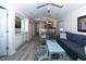 Open concept living space with light flooring and view of kitchen at 638 Waterway Village Blvd. # 16G, Myrtle Beach, SC 29579