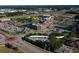 Aerial view of commercial area with buildings and parking lots at 7027 Watercress Dr., Myrtle Beach, SC 29579