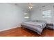 Bedroom with queen bed, hardwood floors, and ceiling fan at 709 63Rd Ave. N, Myrtle Beach, SC 29572