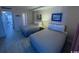 Two double beds in a condo bedroom with light wood flooring at 7500 N Ocean Blvd. # 6145, Myrtle Beach, SC 29572
