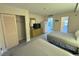 Condo bedroom with two double beds, dresser, and kitchenette view at 7500 N Ocean Blvd. # 6145, Myrtle Beach, SC 29572