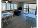 Living room with ocean view and comfy seating at 7500 N Ocean Blvd. # 6145, Myrtle Beach, SC 29572