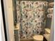 Bathroom with shower/tub combo and coastal-themed decor at 804 Brenda Pl., Myrtle Beach, SC 29577