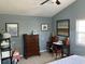 Bedroom with dresser, desk, and artwork at 804 Brenda Pl., Myrtle Beach, SC 29577
