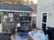 Outdoor patio with hot tub, TV, and seating for entertaining at 804 Brenda Pl., Myrtle Beach, SC 29577