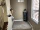 A carpeted staircase with a unique rope railing at 804 Brenda Pl., Myrtle Beach, SC 29577