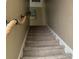 View of a carpeted staircase from the bottom at 804 Brenda Pl., Myrtle Beach, SC 29577