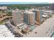 Aerial view of oceanfront resort complex with multiple buildings, pools, and beach access at 9550 Shore Dr. # 229, Myrtle Beach, SC 29572