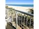 Relaxing balcony with partial ocean view and outdoor seating area at 9550 Shore Dr. # 229, Myrtle Beach, SC 29572