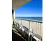 Ocean view balcony with chairs and tables at 9550 Shore Dr. # 429, Myrtle Beach, SC 29572