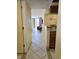 Hallway view of condo showing kitchen and living room at 9550 Shore Dr. # 429, Myrtle Beach, SC 29572