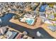 Aerial view of a community pool surrounded by lakes, trees, and houses at 980 Desert Wheatgrass Dr., Myrtle Beach, SC 29579