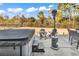 Backyard with a hot tub, patio furniture, a heater, and a wrought iron fence at 980 Desert Wheatgrass Dr., Myrtle Beach, SC 29579