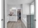 Bright bathroom with a double vanity, marble countertops, a soaking tub, and a separate glass door shower at 980 Desert Wheatgrass Dr., Myrtle Beach, SC 29579