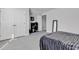 Comfortable bedroom featuring neutral walls, carpet, closet with doors, and natural light at 980 Desert Wheatgrass Dr., Myrtle Beach, SC 29579