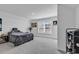 Bright bedroom with a comfortable bed, fan, and natural light streaming through the window at 980 Desert Wheatgrass Dr., Myrtle Beach, SC 29579