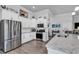 Well-lit kitchen featuring modern stainless steel appliances and white cabinets at 980 Desert Wheatgrass Dr., Myrtle Beach, SC 29579