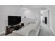 Cozy upstairs living room with a comfortable couch and a large television at 980 Desert Wheatgrass Dr., Myrtle Beach, SC 29579