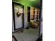 Inviting front porch with yellow chairs and decorative wreath at 106 Fonza St., Conway, SC 29526