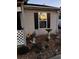 Neat landscaping with bird bath and decorative elements at 106 Fonza St., Conway, SC 29526