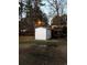 White shed with gray trim in the backyard at 106 Fonza St., Conway, SC 29526