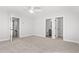 Bedroom with carpet, access to bathroom and stairs at 1113 Crooked Hook Rd., North Myrtle Beach, SC 29582