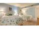 Charming bedroom featuring two cozy beds with decorative pillows and seashell-themed bedding at 14 Stillwood Dr. # 2, Pawleys Island, SC 29585