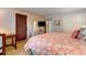 Bedroom featuring a queen-sized bed, dresser with TV, and closet at 14 Stillwood Dr. # 2, Pawleys Island, SC 29585