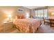Cozy bedroom featuring a plush bed, soft lighting, and a scenic window view at 14 Stillwood Dr. # 2, Pawleys Island, SC 29585