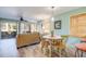 Inviting living space with a screened patio view and comfortable, neutral-toned seating at 14 Stillwood Dr. # 2, Pawleys Island, SC 29585