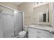 Bathroom with shower, toilet and granite countertop at 143 Crane Dr. # A, Pawleys Island, SC 29585