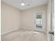 Bright bedroom with door leading to backyard at 143 Crane Dr. # A, Pawleys Island, SC 29585