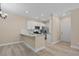 Modern kitchen with white cabinets and granite countertops at 143 Crane Dr. # A, Pawleys Island, SC 29585