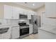 Modern kitchen with stainless steel appliances and granite countertops at 143 Crane Dr. # A, Pawleys Island, SC 29585