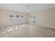 Spacious living room with hardwood floors and lots of natural light at 143 Crane Dr. # A, Pawleys Island, SC 29585