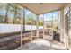 Screened porch with access to backyard and wooded area at 143 Crane Dr. # A, Pawleys Island, SC 29585