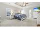 Spacious bedroom with carpeted floors and ensuite bathroom at 144 Shenandoah Dr., Murrells Inlet, SC 29576