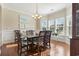 Spacious dining room with hardwood floors and large windows at 144 Shenandoah Dr., Murrells Inlet, SC 29576