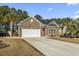 Brick home with attached two-car garage at 144 Shenandoah Dr., Murrells Inlet, SC 29576