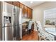 Kitchen with built-in desk and stainless steel appliances at 144 Shenandoah Dr., Murrells Inlet, SC 29576