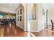 Open living room with hardwood floors and access to Gathering room at 144 Shenandoah Dr., Murrells Inlet, SC 29576