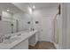 Double vanity bathroom with shower and linen closet at 161 Saddle St, Conway, SC 29527
