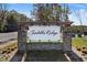 Saddle Ridge community entrance sign with brick pillars and wood pergola at 161 Saddle St, Conway, SC 29527