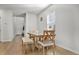 Small dining area with wooden table and bench seating for four at 161 Saddle St, Conway, SC 29527