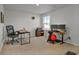 Spacious home office with two desks and a large window, offering ample natural light at 161 Saddle St, Conway, SC 29527