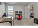 Bright home office features built-in shelving and plenty of space for a desk and computer at 161 Saddle St, Conway, SC 29527